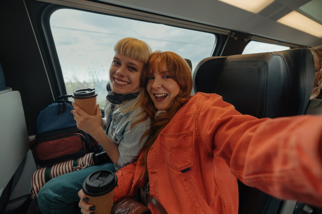 Two,Happy,Women,Sharing,A,Moment,While,Taking,A,Selfie